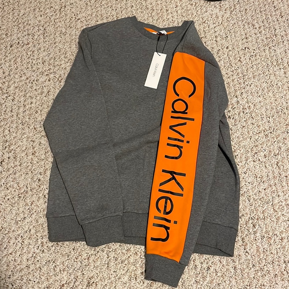 Calvin Klein gray and orange crewneck brand new size medium